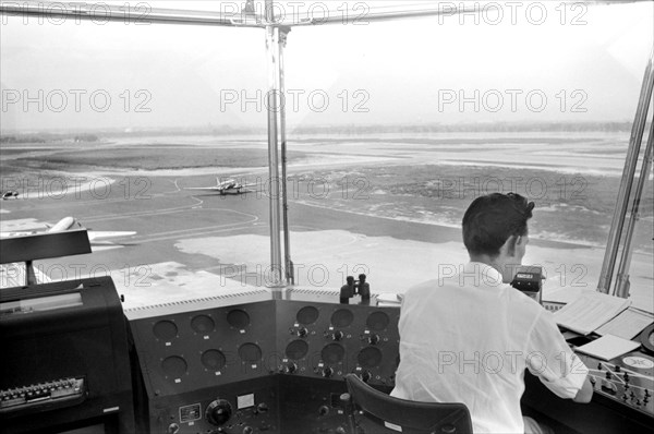 Air Traffic Controller in Control Tower, Municipal Airport, Washington DC, USA, Jack Delano, Farm Security Administration, July 1941