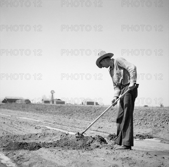 Farmer Fighting Drought and Dust with Irrigation, Cimarron County, Oklahoma, USA, Arthur Rothstein, Farm Security Administration, April 1936