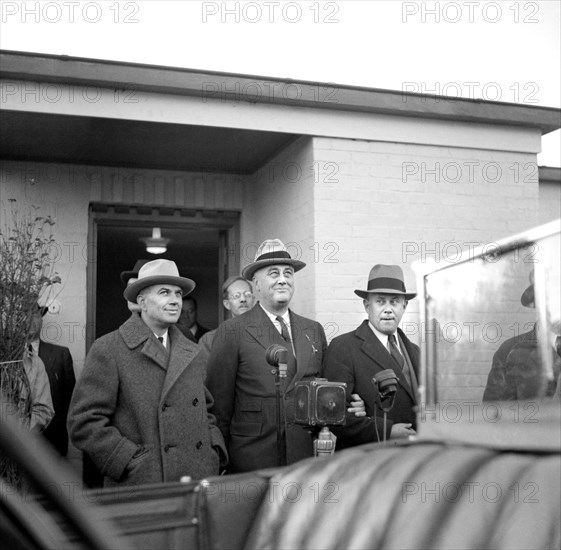 U.S. President Franklin Roosevelt with Resettlement Adminstration Head Rexford G. Tugwell (to Roosevelt's Right), at new Cooperative Housing Development, Greenbelt, Maryland, USA, Arthur Rothstein, Farm Security Administration, November 13, 1936