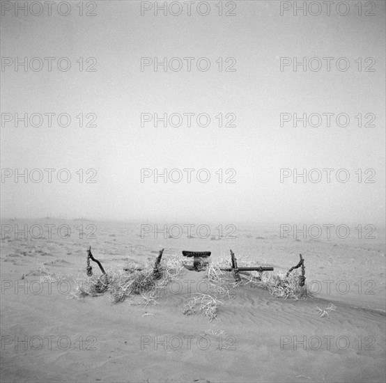 Farm Equipment Buried under Sand During Severe Wind Storm, Boise City, Oklahoma, USA, Arthur Rothstein, Farm Security Administration, April 1936