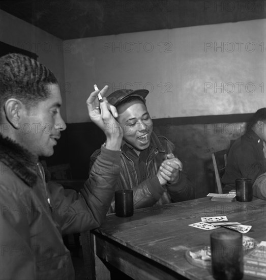 Tuskegee Airmen Playing Cards in Officers' Club, left to right: Walter M. Downs, New Orleans, LA, Class 43-B and William S. Price, III, Topeka, KS, Class 44-C, Ramitelli, Italy, Toni Frissell, March 1945