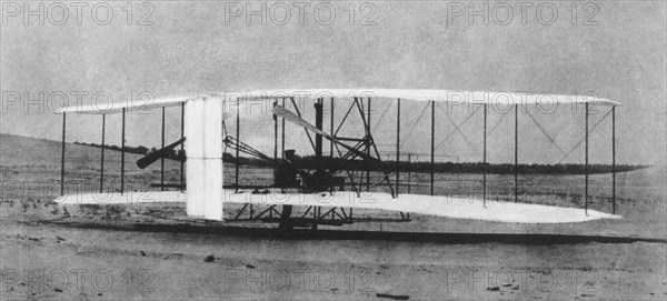 Orville Wright with the First Wright Brothers Airplane, Kitty Hawk, North Carolina, USA, circa 1903