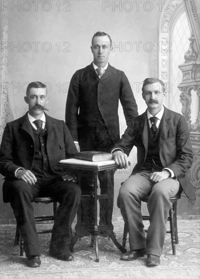 Three Men at Table, Studio Portrait, Dunkirk, New York, USA, circa 1893