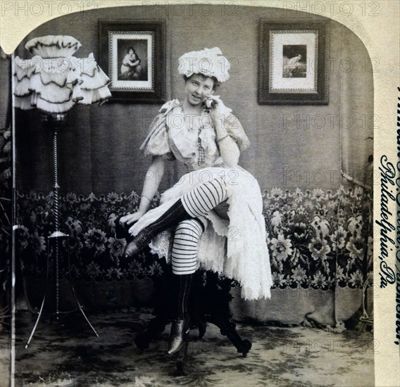 Seated Woman with Striped Stockings Holding Banana to Ear, Single Image of Stereo Card, circa 1900