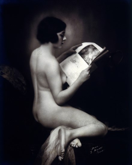 Nude Woman Reading Newspaper, Paris, France, 1925