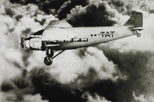 Ford Trimotor Airplane in Flight, circa 1930