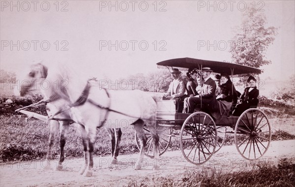 Group of People in Horse-Drawn Wagon, New York, USA, circa 1900