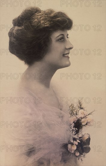 Smiling Woman in Formal Dress and Corsage of Flowers, Profile Portrait, Hand-Colored Card