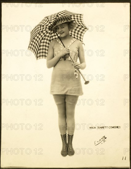 Woman in One-Piece Bathing Suit Holding Parasol, Mack Sennett Bathing Beauty, circa 1920