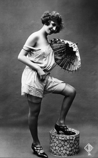 French Lingerie Model Posing with Parasol, circa 1920