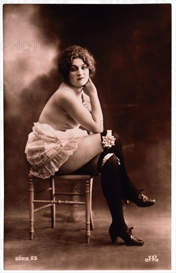 French Lingerie Model Posing on Chair, circa 1920