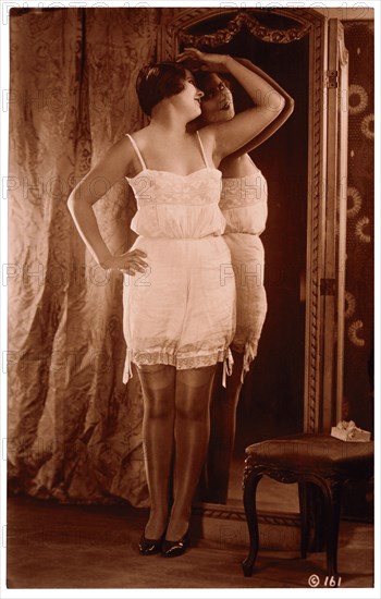 French Lingerie Model Leaning Against Mirror, circa 1920