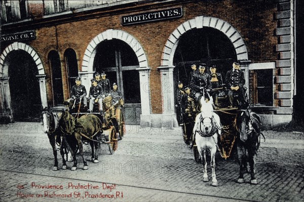 Firemen on Horse-Drawn Fire Trucks in Front of Firehouse, Providence, Rhode Island, USA, Hand-Colored Photograph, 1902