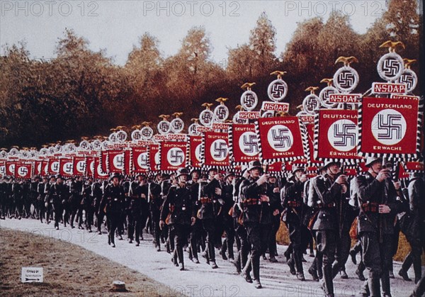 German SS Troops Bearing Standards March in Zeppelin Field, Nurnberg, Germany, 1933