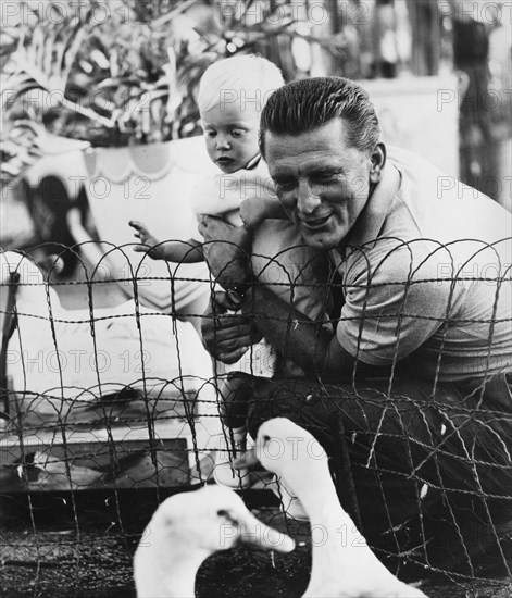 Kirk Douglas on-set of the Film, "Strangers When We Meet", 1960