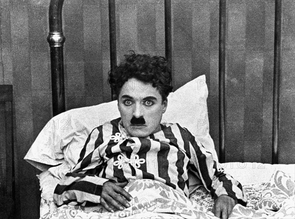 Charlie Chaplin on-set of the Film, "The Adventurer", 1917