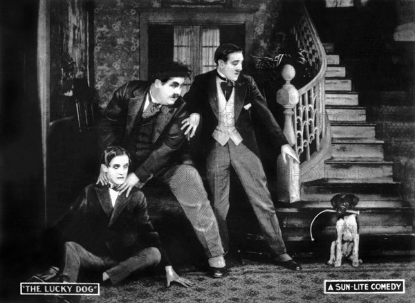 Stan Laurel, Oliver Hardy & Jack Lloyd on-set of the Film, Lucky Dog, 1921