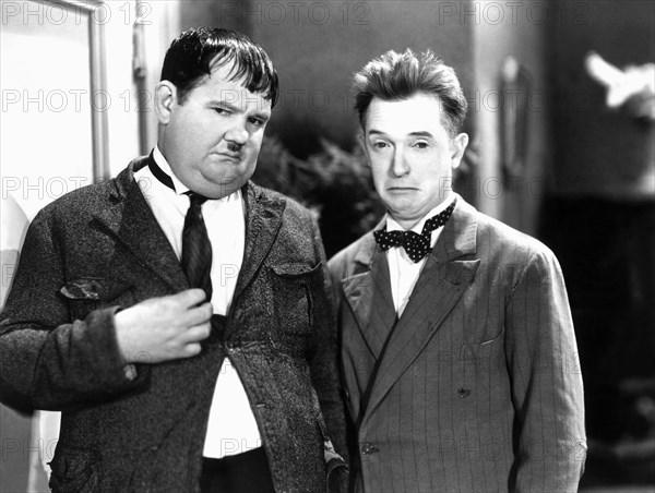 Oliver Hardy and Stan Laurel on-set of the Film, One Good Turn, 1931