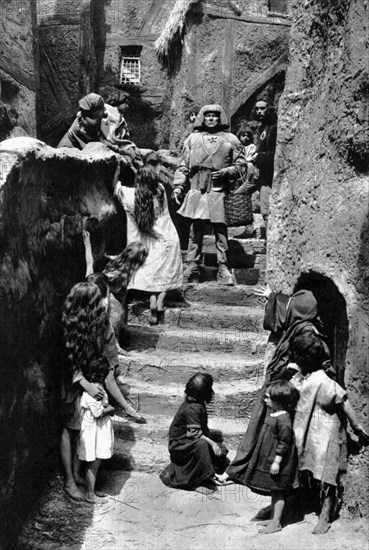 Paul Wegener (center), on-set of the Silent Film, "The Golem: How He Came Into The World", 1920