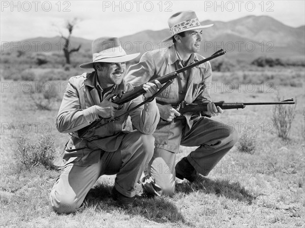 Robert Preston and Gregory Peck, on-set of the Film, "The Macomber Affair" directed by Zoltan Korda, 1947