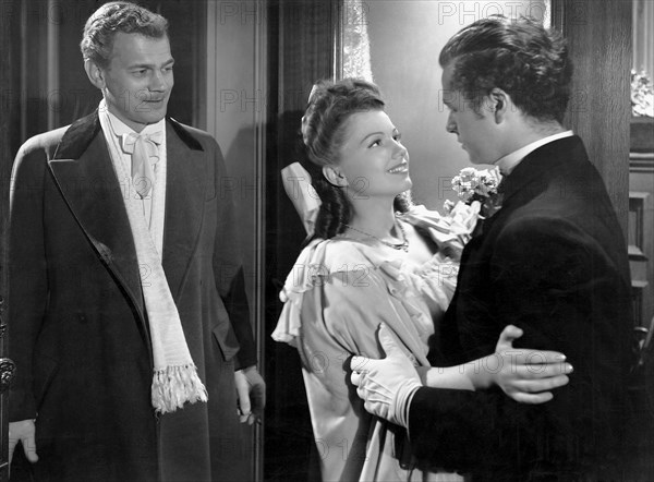 Joseph Cotten, Anne Baxter and Tim Holt, on-set of the Film, "The Magnificent Ambersons" directed by Orson Welles, 1942