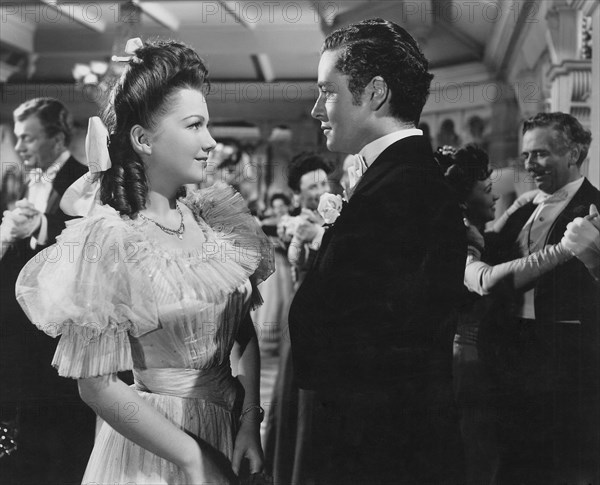 Joseph Cotten, Anne Baxter, Tim Holt and Ray Collins, on-set of the Film, "The Magnificent Ambersons" directed by Orson Welles, 1942