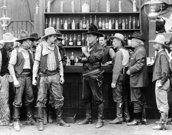 William S. Hart and Robert McKim and group of Men, on-set of the Silent Film, "Return of Draw Egan", 1916