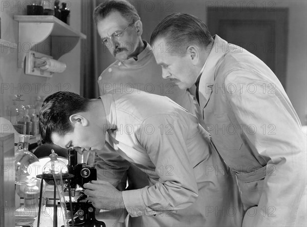 Richard Barthelmess (center) & John St. Polis (rear), on-set of the Film, "Alias the Doctor",  1932