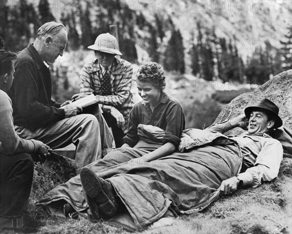 Director Sam Wood, Cinematographer Ray Rennahan, Ingrid Bergman, Gary Cooper on-set of the Film, "For Whom the Bell Tolls", 1943