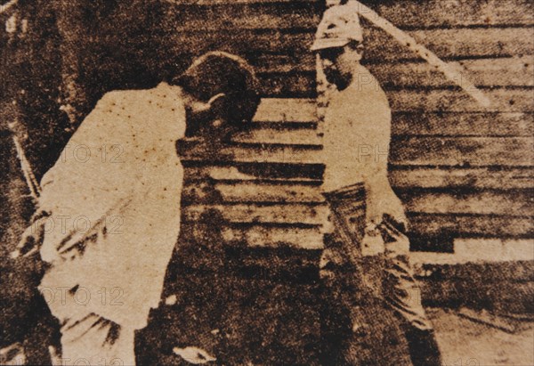 Japanese Soldier about to Behead a Chinese Prisoner during Second Sino-Japanese War, circa 1937