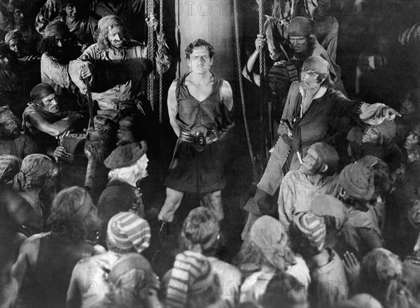 Douglas Fairbanks, (center), on-set of the Silent Film, "The Black Pirate", 1926