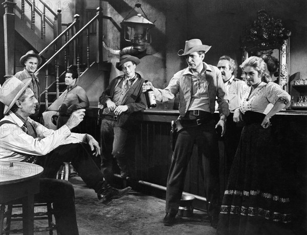 Randolph Scott, (left), William Leslie, on-set of the Film, "Buchanan Rides Alone", 1958