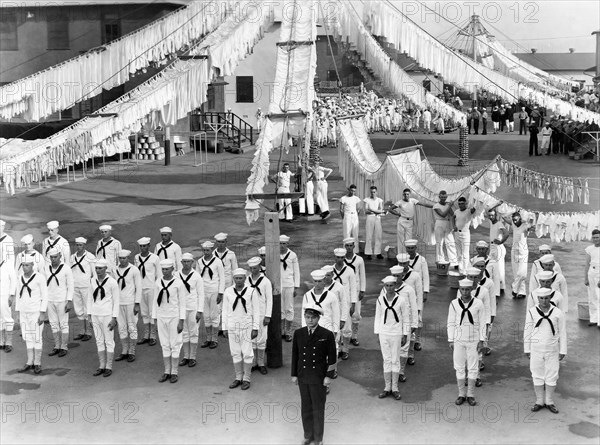 Edward G. Robinson (center) Amongst Large Group of Sailors Standing at Attention, on-set of the Film, "Destroyer", 1943