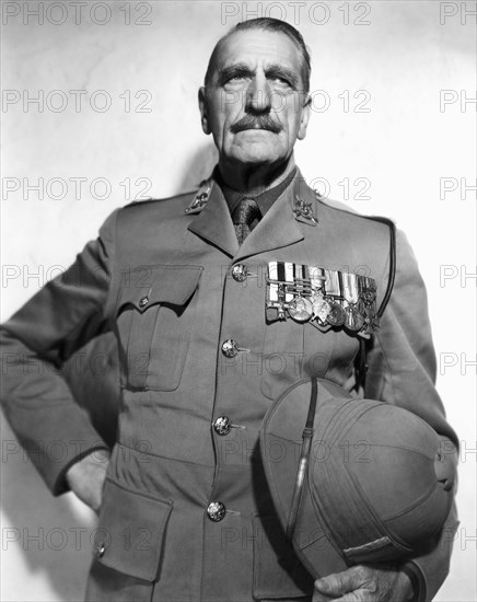 C. Aubrey Smith, on-set of the Film, "Four Men and a Prayer", 20th Century Fox, 1938