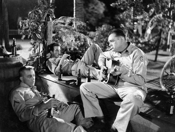 Montgomery Clift, (center), Mickey Shaughnessy (right), on-set of the Film, "From Here to Eternity", 1953