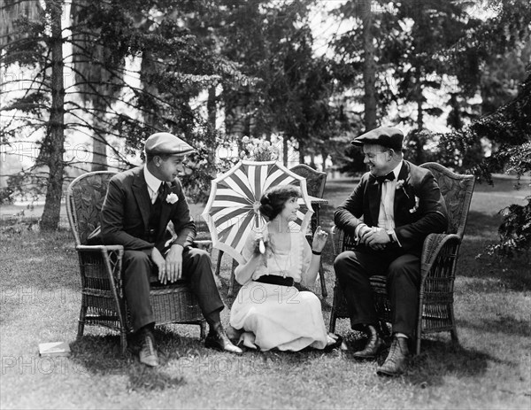 Peggy Hyland, (center), on-set of the Silent Film, "A Girl in Bohemia", 1919