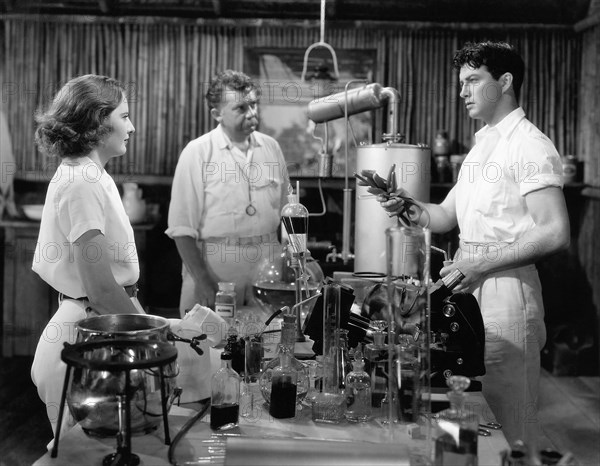 Barbara Stanwyck, Jean Hersholt, Robert Taylor, on-set of the Film, "His Brother's Wife", 1936