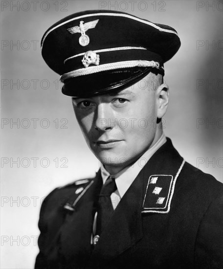 Tim Holt, Publicity Portrait, on-set of the Film, "Hitler's Children", 1943