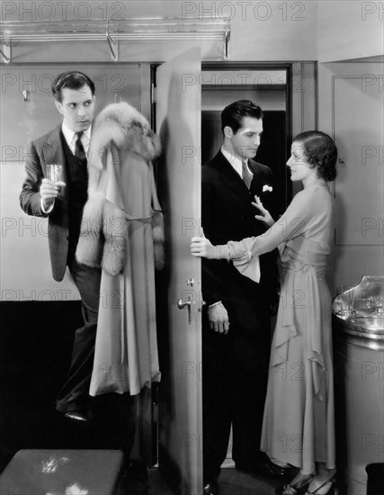 Ramon Novarro, Kane Richmond, Martha Sleeper, on-set of the Film, "Huddle", 1932