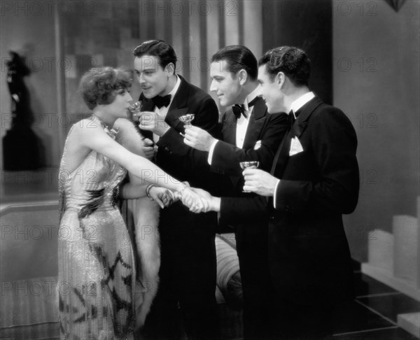 Joan Crawford, Nils Asther, (Left), on-set of the Silent Film, "Our Dancing Daughters", 1928