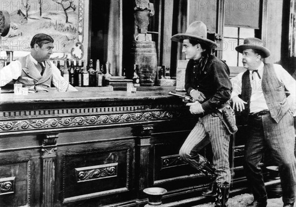 Tom Mix (Center), on-set of the Silent Film, "Prairie Trails", 1920