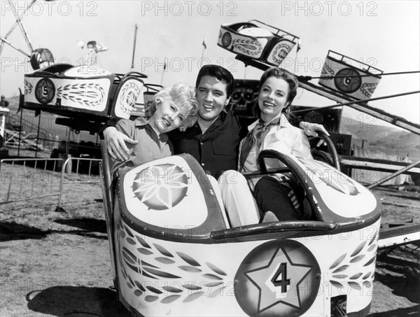 Barbara Stanwyck, Elvis Presley & Joan Freeman, on-set of the Film, "Roustabout", 1964