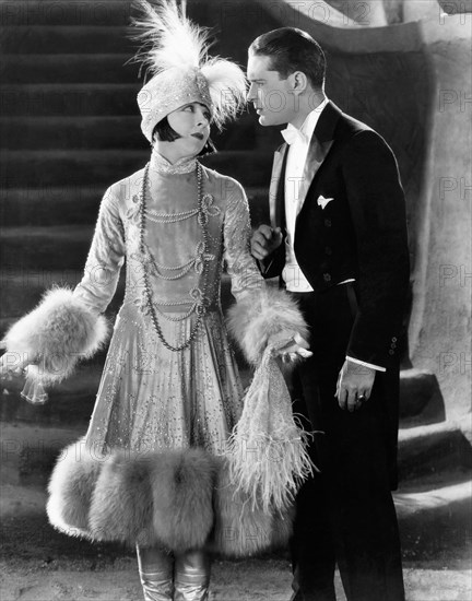 Colleen Moore and Lloyd Hughes, on-set of the Silent Film, "Sally", 1925