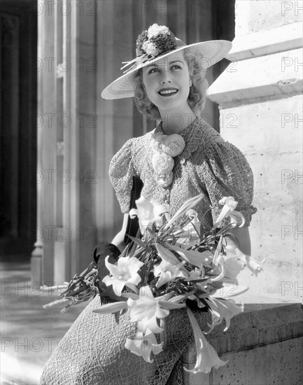 Anita Louise, American Actress, Portrait Holding Bouquet of Flowers, 1936