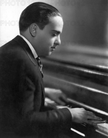 Vincent Lopez, American Bandleader and Pianist, Portrait Playing Piano, circa 1930's