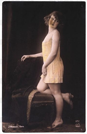Lingerie Model Standing, One Knee on Stool, Portrait, circa 1920