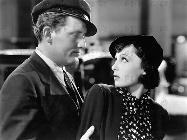 Spencer Tracy, Luise Rainer, on-set of the Film, "Big City", 1937