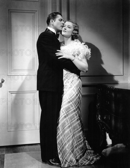 Warner Baxter, Myrna Loy, on-set of the Film, "Broadway Bill", 1934