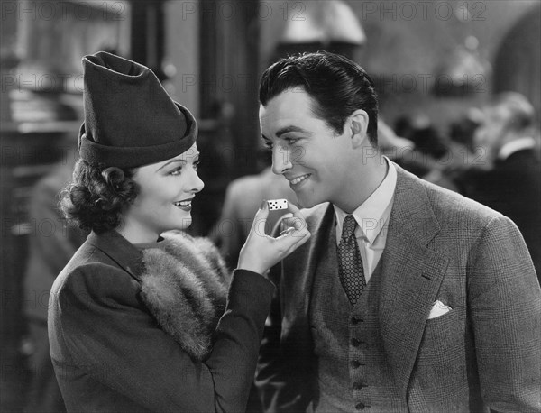 Myrna Loy, Robert Taylor, on-set of the Film, "Lucky Night", 1939