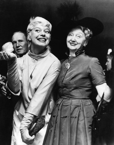 Carol Channing, Hedda Hopper at a Hollywood party, 1957